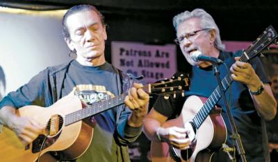 The guitarist G.E. Smith and the artist Dan Rizzie, shown at the Stephen Talkhouse in Amagansett, will perform with Carter Burwell, a composer, and Ralph Gibson, a photographer, at Bay Street Theater on Saturday.