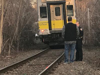 East Hampton Village police responded to investigate what led to two people being struck by an eastbound train Saturday afternoon.