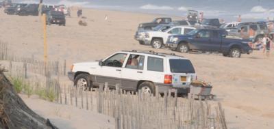 Neighbors opposed to the summertime gathering of vehicles on a stretch of Napeague Beach are stepping up efforts to stop the practice.