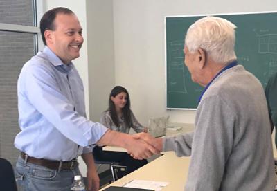 Representative Lee Zeldin, left, greeted a visitor during a mobile office hours event in Southampton in July, 2017.