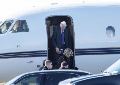 Bill and Hillary Clinton at East Hampton Airport on Saturday. They attended a funeral at St. Luke's Episcopal Church for Thomas A. Twomey, who died of a heart attack on Sunday.