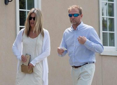 Denise and Richard Klein walked toward East Hampton Town Justice Court on Aug. 31 for his arraignment on two housing code violations.