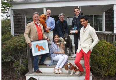 The designers of this year’s Animal Rescue Fund of the Hamptons showhouse posed with dogs and items from their rooms on the stairs of ARF’s Thrift and Treasure Shop in Sagaponack on Friday, above. Charlie, Jack Deamer’s poodle, below, presided over her master’s Toile Hall space, still in progress.