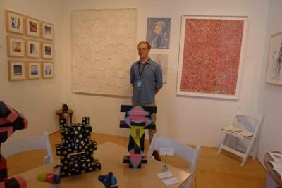 Scott Bluedorn at his booth in the Market Art + Design fair this summer