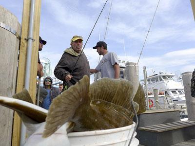 A bucket of big fluke proved the success of the Lazy Bones party boat’s afternoon trip on Monday.