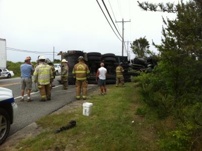 A garbage truck flipped and crashed on the Napeague stretch of Montauk Highway Friday afternoon.