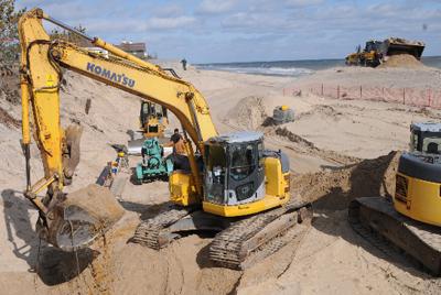 Mollie Zweig has won one round in a court fight over whether she can line the beach-front bluff at her East Hampton Village property with a 166-foot-long wall of stone.