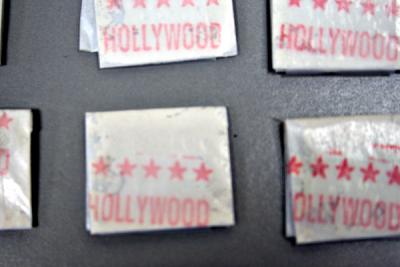 The alleged heroin packs were stamped in red with the word, "Hollywood."