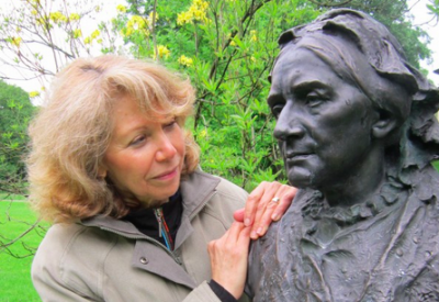 Victoria Bond, with a statue of Clara Schumann, will write a choral piece about Moses for the Choral Society's 70th season.