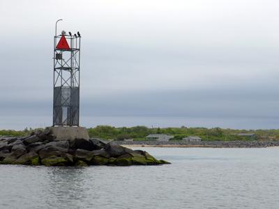 Montauk's inlet jetty with the narrow Soundview Drive beach in the background