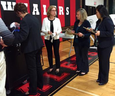 Sag Harbor School District officials tallied the votes in the gymnasium at Pierson High School on Tuesday night.