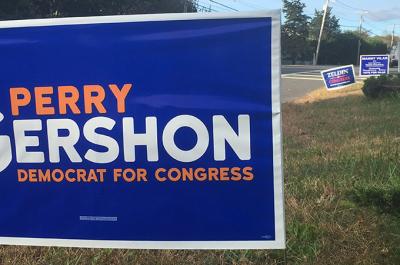 First District road signs are just one battleground between incumbent Representative Lee Zeldin and Perry Gershon.