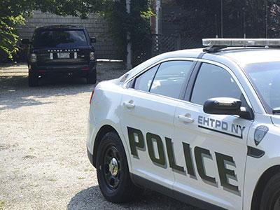 A source close to the investigation of an alleged rape in East Hampton on Tuesday said that police found Jason Lee, a Goldman Sachs banker arrested in connection with the incident, crouched inside a parked Range Rover.