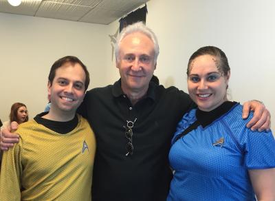 The writer, pictured at right dressed as a "trill" from Star Trek, and her boyfriend, Michael Gutman, left, paid $60 for a signed portrait and photograph with Brent Spiner, center, the actor who played "Lieutenant Commander Data" on Star Trek: The Next Generation.