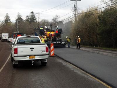 Montauk Highway resurfacing in East Hampton Village resumed on Thursday morning after a delay due to an interruption in the asphalt supply.