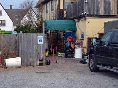 The Shagwong restaurant's back entrance, where a fish sale gone bad may have led to a spat.