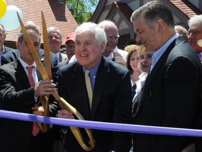 Tom Twomey, center, at the dedication of the East Hampton Library's new chidren's wing in June.