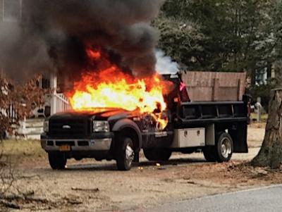 The owner of this truck parked on Neck Path in Springs returned home to find it in flames.