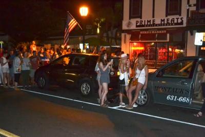 Crowds flooded into the street in downtown Montauk on Tuesday to watch the Fourth of July fireworks there. The four-day holiday weekend kept East Hampton Town police, fire marshals, and ordinance enforcement and marine patrol officers busy.