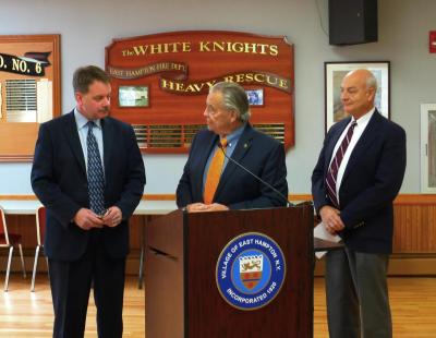 Mayor Paul F. Rickebach Jr., center, and Richard Lawler, right, an East Hampton Village Board member, thanked Jerry Larsen for his service to the village as he prepared to leave his post in January.