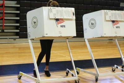 A voter at Pierson High School in Sag Harbor filled in her ballot on Tuesday.