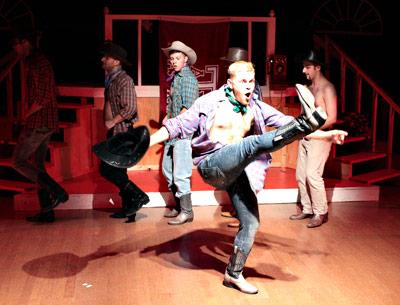 Adam Fronc leads a country and western number in a production of “The Best Little Whorehouse in Texas” at the Southampton Culture Center.