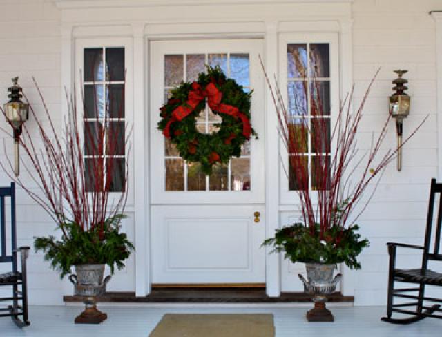 The simplicity of the front porch decorations offers a hint of the festive yet restrained approach throughout the house.
