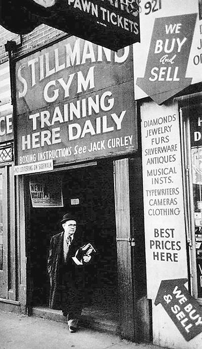 Charley Goldman, the noted boxing trainer, leaving Stillman's Gym back in its heyday.