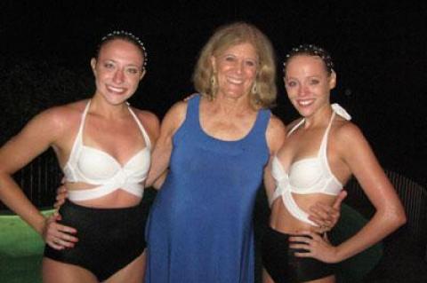 Two Eau La La Entertainment swimmers, Georgia Luch, at right, the founder of the troupe, and Emily Terwelp, left, posed with Lynn Sherr, the author of “Swim,” on Saturday night.