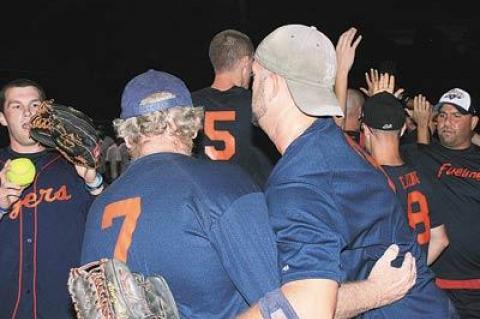 The Fuelmen celebrated after prevailing 9-7 in nine innings last week over the three-time-defending-champion Independent.