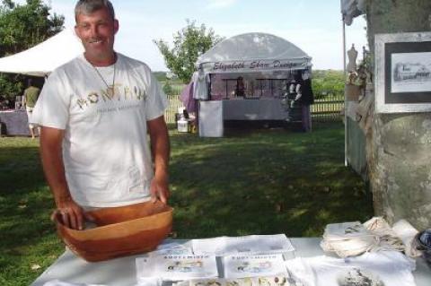 Lawrence Cooke set up his Indian artifacts displays at the Montauk Historical Society’s craft fair last week to drum up interest and collect donations.