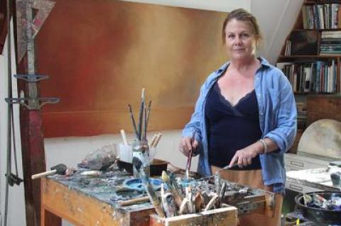 Although she often starts her canvases at the beaches she depicts, Cynthia Knott works in her studio to finish them.