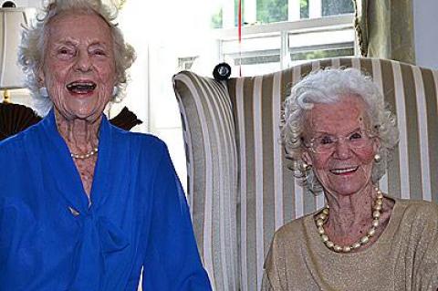 Camilla Jewett, left, and Elsie Garretson soaked up the attention at their 100th birthday celebration hosted by the Ladies Village Improvement Society on Monday.