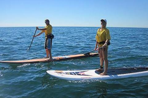 Adam Kelinson and Jessica Bellofatto were among those who paddled 18 miles from Montauk to Block Island last year.