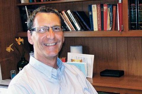 The Rev. Bill Hoffmann settled into his new office at the Montauk Community Church this week.