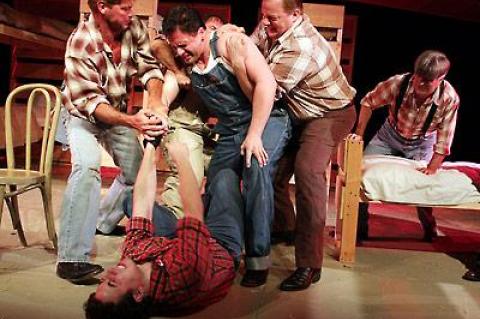 Lennie (Seth Fredericks) snaps and needs to be held back in a tense bunkhouse scene from John Steinbeck’s “Of Mice and Men,” which is at the Levitas Center for the Arts in Southampton through Sunday.