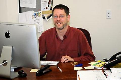 Jeffrey Friedman, executive director of the Retreat, inside his East Hampton office, where he helps lead the fight against domestic abuse throughout the East End.