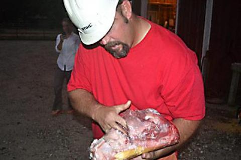 Michael Gaines showed how a chain saw can get down to the bone, in this case on something from the butcher’s case in a recent demonstration.