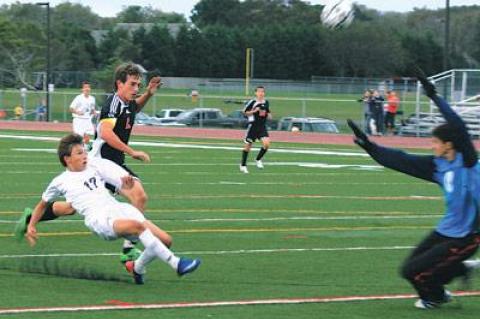 This foul of Esteban Valverde (17) resulted in a penalty kick, which Mario Olaya made near the end of the first half.