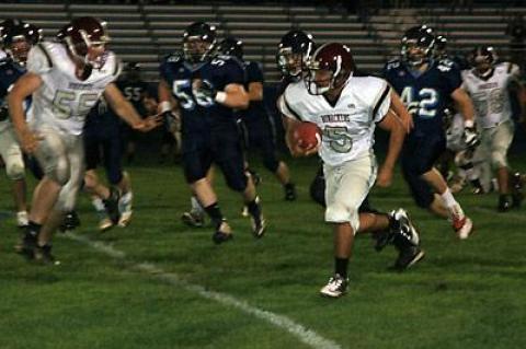 Dan Barros carried the ball on the first drive.