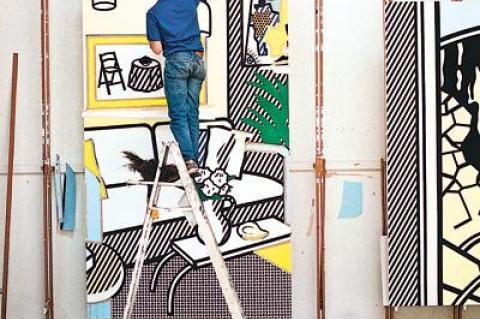 Laurie Lambrecht’s new book has plenty of pictures of Roy Lichtenstein in his studio, including this one with him on a ladder painting an interior scene.