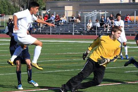 Jean Carlos Barrientos, left, scissor-kicked in East Hampton’s first goal at the end of the first half.