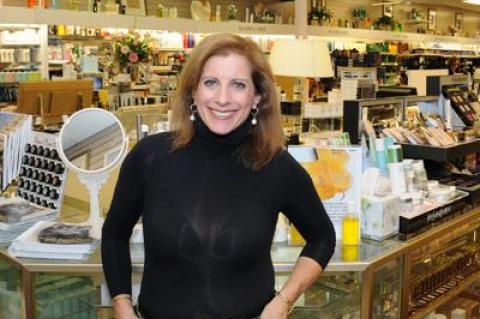 Elise Marmon, whose father, Bradley Marmon, bought White’s Pharmacy in the 1950s, is the cosmetics buyer for the store, which has been on East Hampton Main Street since 1873.