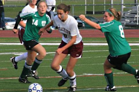 Raffi Franey, center, scored three of East Hampton’s goals in a 4-3 win here Monday over Westhampton Beach in a county Class A outbracket game.