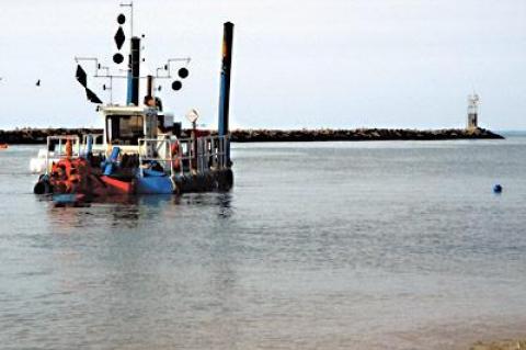 The operation of a dredge by the North American Landscaping, Construction, and Dredge Company was the focus of a heated discussion at the Montauk Coast Guard station on Monday.