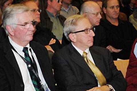 The crowd last Thursday included, from left, Jim Brundige, the airport manager, and Peter Kirsch, an attorney specializing in airport matters.