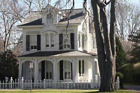 The 1872 Italianate-style James Arrowsmith house may be known as the Gingerbread House, but the fretwork on its porch was actually added later.