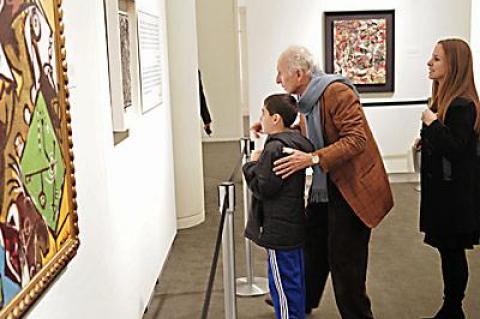 Ron Delsener took in a painting with his daughter and grandson at Sotheby’s on Dec. 13.