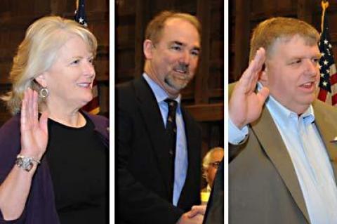 East Hampton Town Councilwoman Sylvia Overby, left, and her Democratic running mate, Peter Van Scoyoc, center, the two top vote-getters in the recent board election, were sworn in at Town Hall on Tuesday, as was Stephen Lynch, right, as highway superintendent.