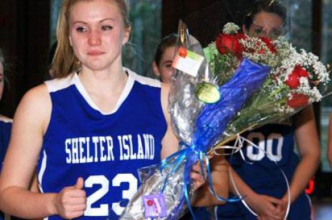 Kelsey McGayhey’s first basket in Friday’s game at the Ross School was notable for the fact that, with it, she became the first Shelter Island High School female to reach the 1,000-point plateau. 	Kelsey McGayhey’s first basket in Friday’s game at the Ross School was notable for the fact that, with it, she became the first Shelter Island High School female to reach the 1,000-point plateau.